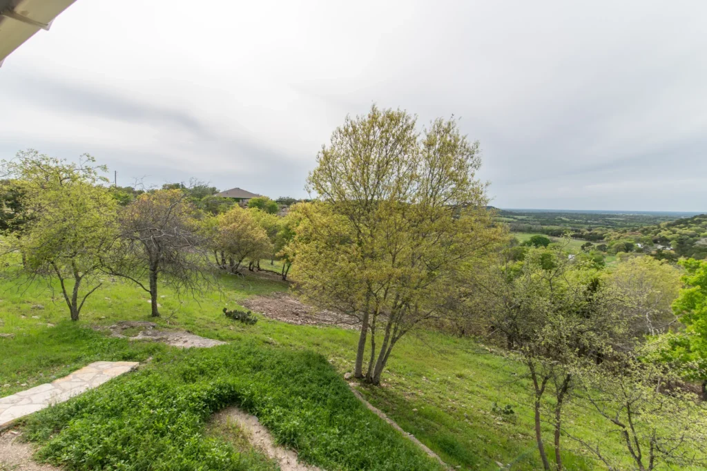 Lush green Hill Country landscape at Love of the View, providing a quiet setting for a digital detox and unplugged weekend in Glen Rose.
